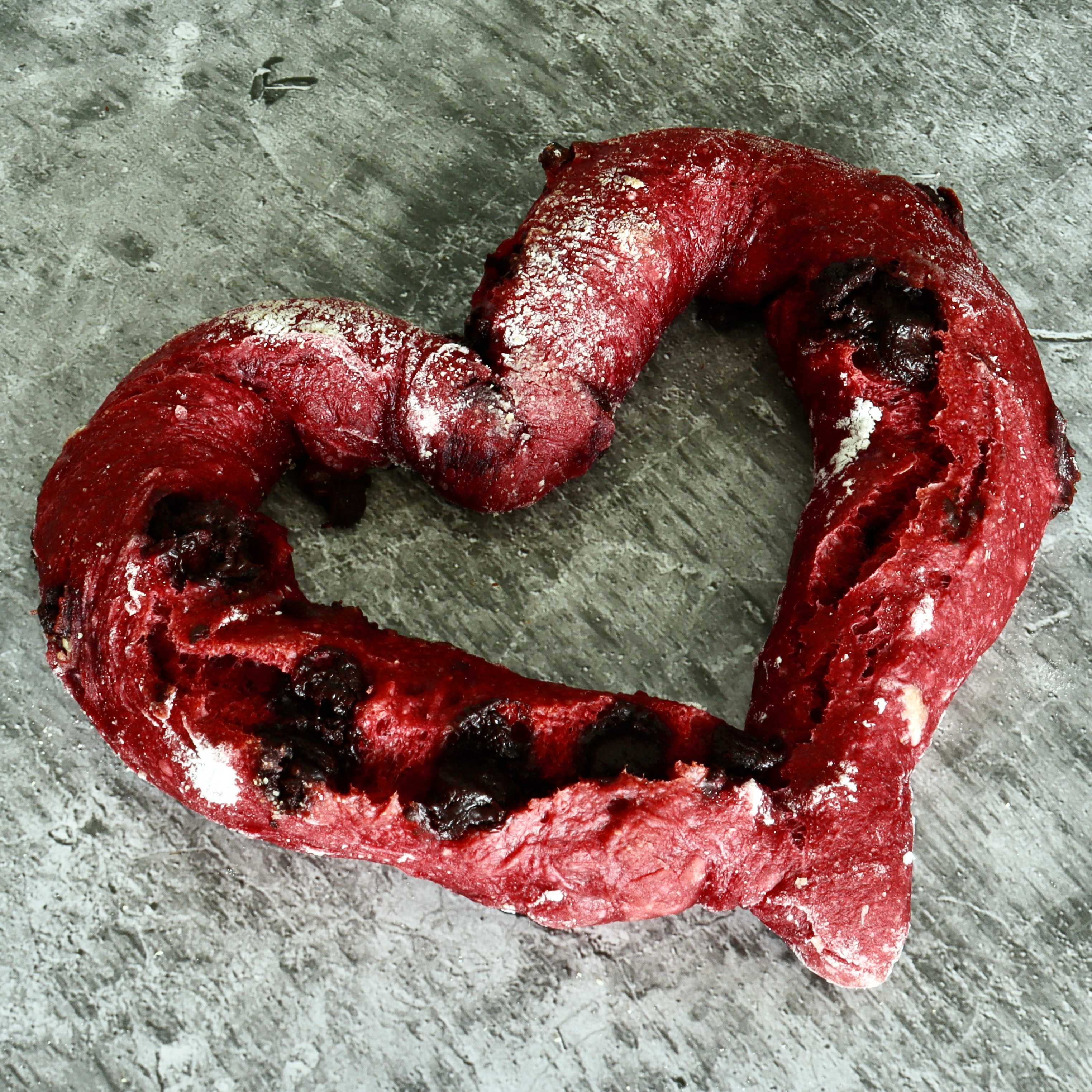 Our signature sourdough with a sweet-tart twist—blended with raspberry purée, semi-sweet chocolate chips, and finished with dried cranberries. Fruity, rich, and irresistible in every bite.